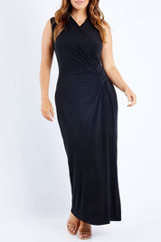 Model Laura wearing size 14 of the Elisha Dress in colour Black (Black), from the front, cropped image