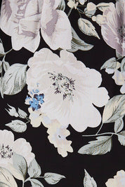 Product shot of the Natasha Dress in colour Floral (Black), detail