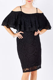 Model Rebecca wearing size 10 of the Suzette in colour black (Black), from the front, cropped image