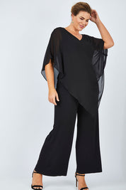 Model Fiona wearing size 16 of the Marie Top in colour Black (Black), from the front, showing the whole outfit