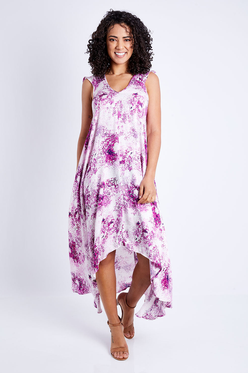 Model Pamela wearing size 10 of the Prue Dress in colour Jacaranda (Pink), from the front, showing the whole outfit