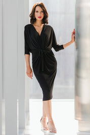 Model Andrea wearing size 10 of the Nancy Dress in colour Black (Black), from the front, showing the whole outfit