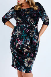 Model Fiona wearing size 16 of the Janelle Dress in colour Moonstone (Black), from the front, cropped image