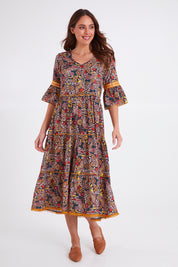 Model Madeline wearing size S of the Avlon Midi in colour Beatrix (Black), from the front, showing the whole outfit