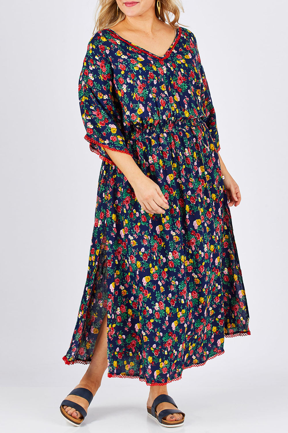 Model Ljubenka wearing size XXL of the Flamingo Dress Roza Print in colour Navy (Blue), from the front, cropped image