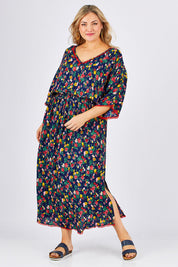 Model Ljubenka wearing size XXL of the Flamingo Dress Roza Print in colour Navy (Blue), from the front, showing the whole outfit