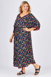 Model Ljubenka wearing size XXL of the Flamingo Dress Roza Print in colour Navy (Blue), from the front, showing the whole outfit