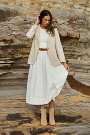 Model Amanda wearing size 10 of the Cotton Linen Longline Blazer in colour Sand, from the front, showing the whole outfit