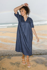 Model Lala wearing size 10 of the Linen Summer Relaxed Dress in colour Blue (Blue), from the front, showing the whole outfit