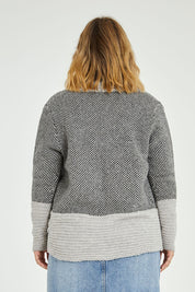 Model Jess wearing size L of the Wool Cocoon Cardigan in colour Grey (Grey), from the back