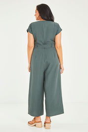 Model Terri-Leigh wearing size 14 of the Linen Blend Jumpsuit in colour Green (Green), from the back