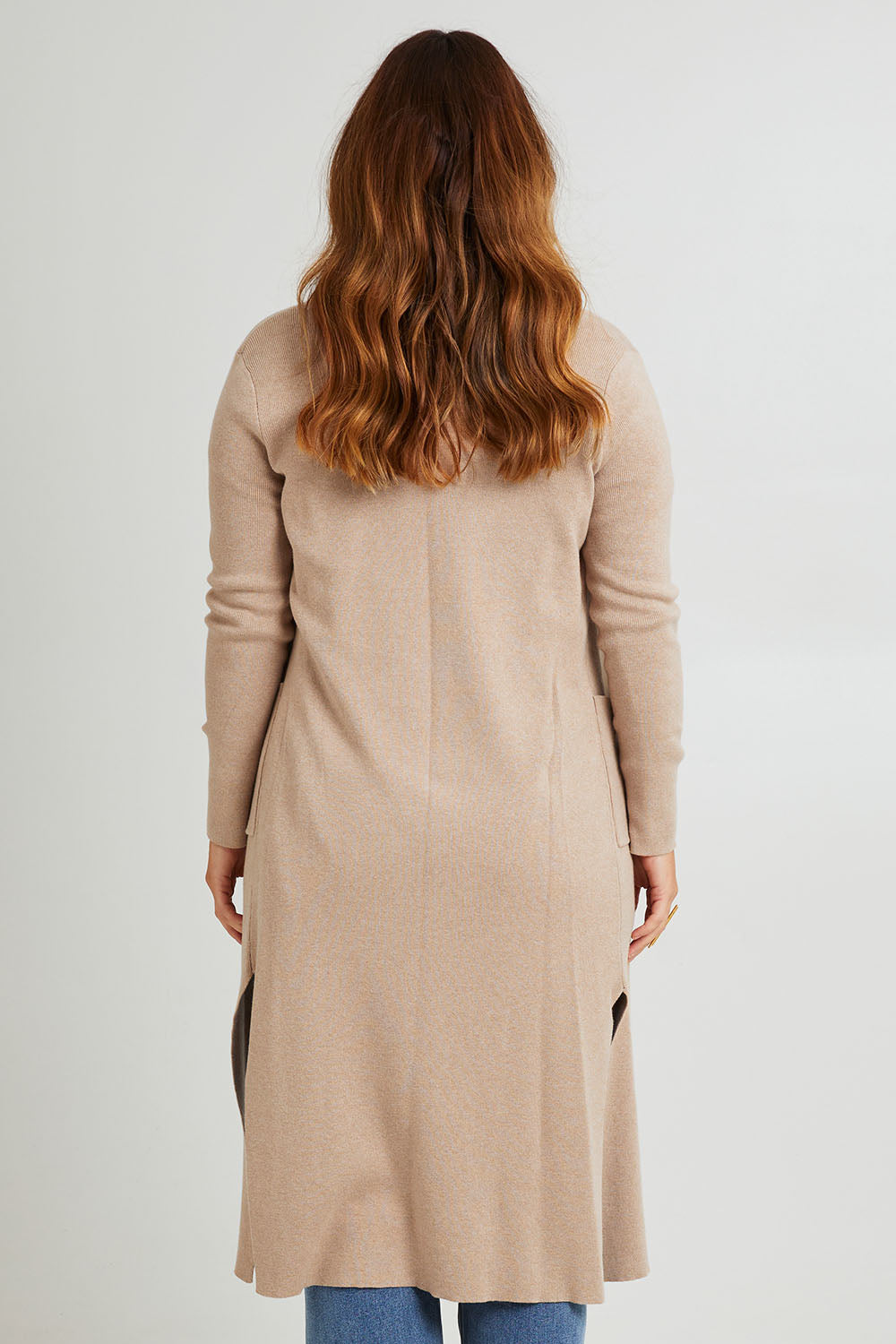 Model Laura wearing size L of the Cotton Cashmere Waterfall Cardigan in colour Lighttaupe, from the back