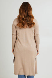 Model Laura wearing size L of the Cotton Cashmere Waterfall Cardigan in colour Lighttaupe, from the back