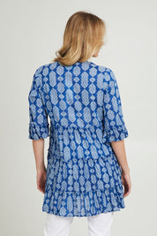 Model Grace wearing size 10 of the Angelina 3/4 Sleeve Tunic in colour Navy (Blue), from the back