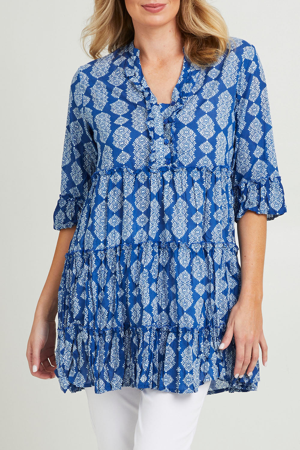 Model Grace wearing size 10 of the Angelina 3/4 Sleeve Tunic in colour Navy (Blue), from the front, cropped image