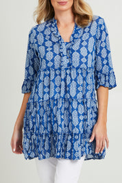Model Grace wearing size 10 of the Angelina 3/4 Sleeve Tunic in colour Navy (Blue), from the front, cropped image
