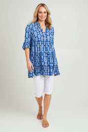 Model Grace wearing size 10 of the Angelina 3/4 Sleeve Tunic in colour Navy (Blue), from the front, showing the whole outfit