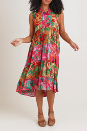 Model Ziara wearing size 10 of the Sleeveless Midi Dress in colour Saopaulo, from the front, cropped image