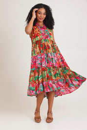 Model Ziara wearing size 10 of the Sleeveless Midi Dress in colour Saopaulo, from the front, showing the whole outfit