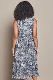 Model Ziara wearing size 10 of the Sleeveless Cotton Boho Dress in colour Navy, from the back