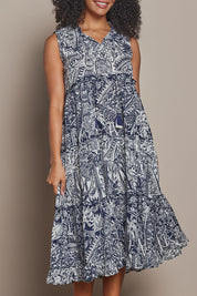 Model Ziara wearing size 10 of the Sleeveless Cotton Boho Dress in colour Navy, from the front, cropped image