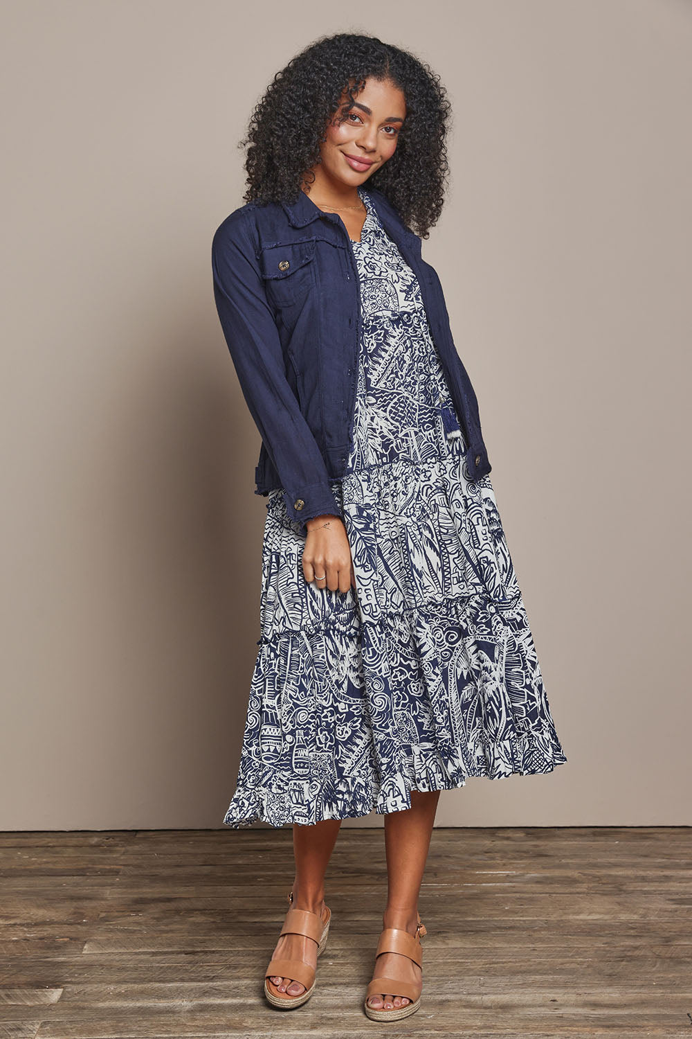 Model Ziara wearing size 10 of the Sleeveless Cotton Boho Dress in colour Navy, from the front, showing the whole outfit