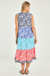 Model Kelly wearing size 10 of the Cappadocia Organic Cotton Sleeveless Dress in colour Mix (Blue), from the back