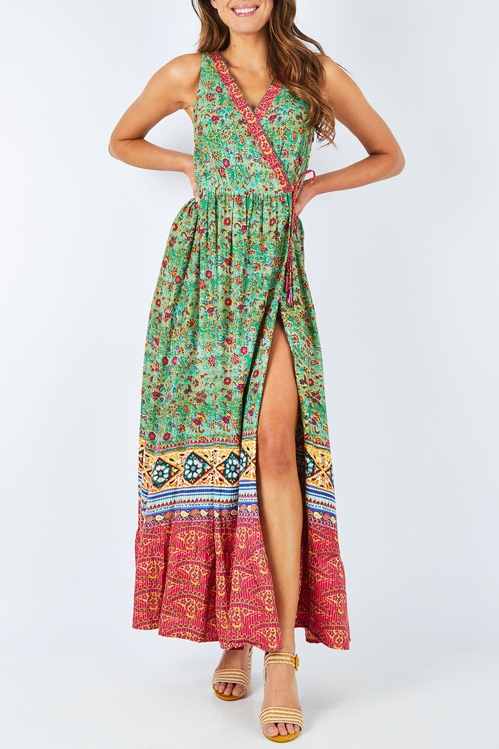 Model Madeline wearing size 10 of the Kea Print Maxi in colour Print (Green), from the front, cropped image