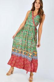 Model Madeline wearing size 10 of the Kea Print Maxi in colour Print (Green), from the front, showing the whole outfit