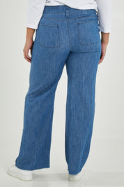 Model Maddy wearing the Higher Rise Teresa Wide Leg in colour Everly (Blue), from the back