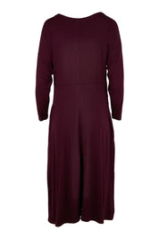 Product shot of the Eden Bamboo Dress in colour Berry (Purple), from the back