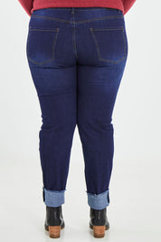 Model Caitlin wearing the Frayed Slim Fit Jean in colour Darkblue (Blue), from the back