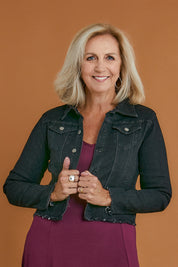 Model Sandy wearing size S of the Denim Jacket in colour Black (Black), from the front, cropped image