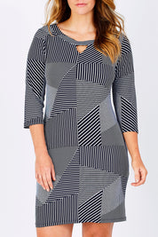 Model Laura wearing size M of the Laney Shift Dress in colour Navy (Blue), from the front, cropped image