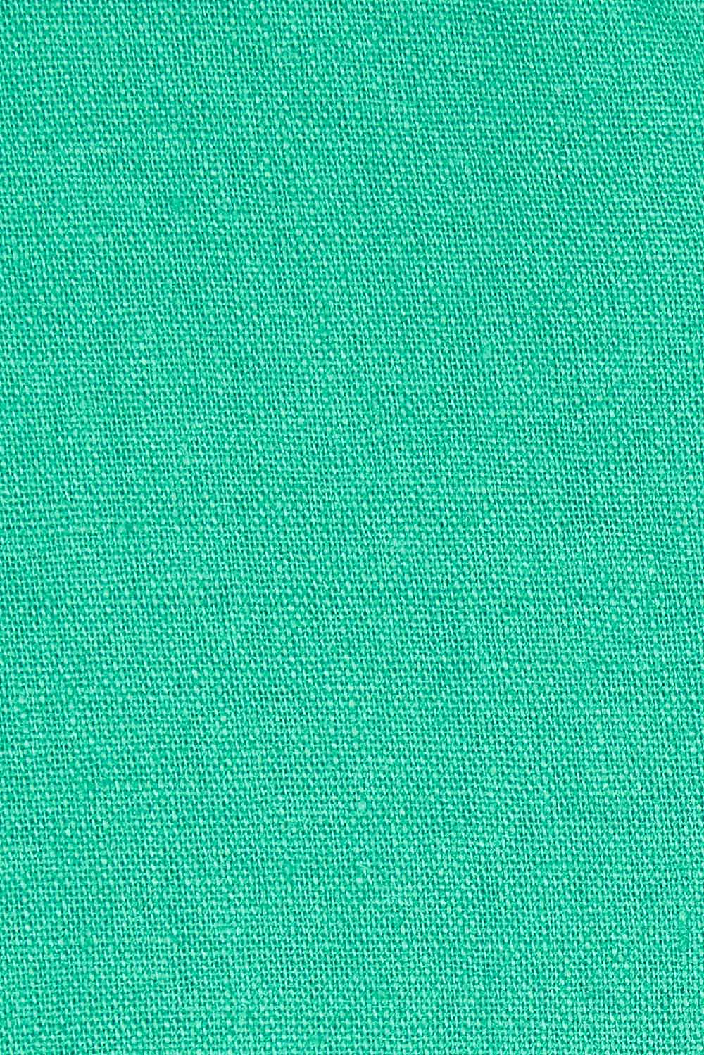 Product shot of the Cotton Linen Woven Top in colour Jade (Green), detail