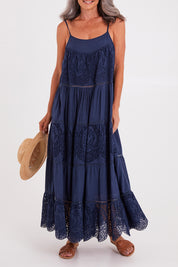 Model Luisa wearing size S of the Carly Maxi in colour Navy (Blue), from the front, cropped image