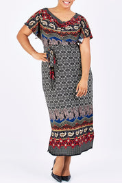 Model Shareefa wearing size 18 of the Villia Lina Maxi in colour BorderPrnt (Grey), from the front, cropped image