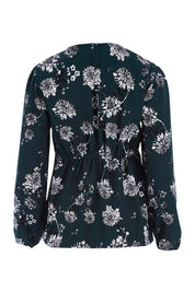 Product shot of the Magnolia Fields Keyhole Blouse in colour Magnolia (Green), from the back