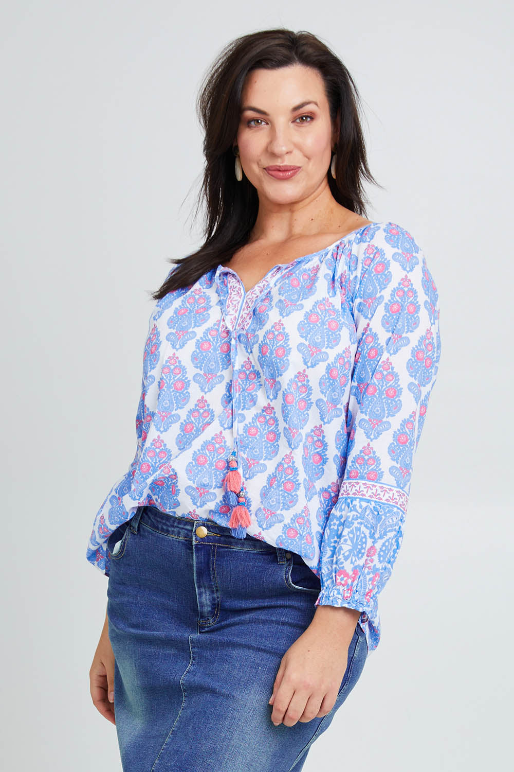 Model Poppy wearing size 16 of the Moonta Bay Cotton Blouse in colour Bluepink (Blue), from the front, cropped image