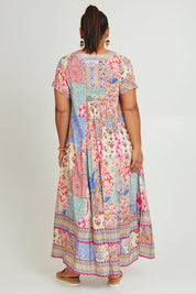 Model Ashleigh wearing size 16 of the Mindil Beach Maxi Dress in colour Patchwork, from the back