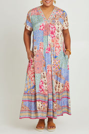Model Ashleigh wearing size 16 of the Mindil Beach Maxi Dress in colour Patchwork, from the front, cropped image