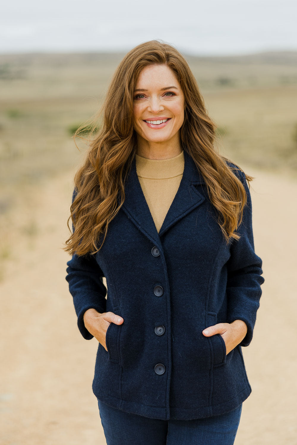 Model Sally wearing size S of the Blazer in colour Navy (Blue), from the front, showing the whole outfit