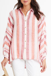 Model Madeline wearing size S of the Milano Shirt in colour Santstrip (Pink), from the front, cropped image