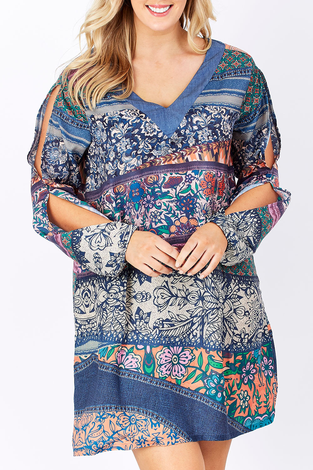 Model Jess wearing the Indica Dress in colour Violet (Purple), from the front, cropped image