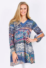 Model Maddy wearing the Indica Dress in colour Violet (Purple), from the front, cropped image