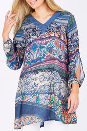 Model Maddy wearing the Indica Dress in colour Violet (Purple), from the front, cropped image