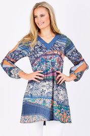 Model Maddy wearing the Indica Dress in colour Violet (Purple), from the front, cropped image