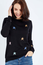 Model Andrea wearing size 10 of the Rita Starburst Sweater in colour Blackmulti (Black), from the front, cropped image