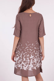 A model wearing size 10 of the ROBBIE 3/4 Sleeve Shift Dress Place M Bird in colour NaturalWht, from the back