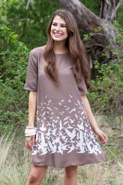 A model wearing size 10 of the ROBBIE 3/4 Sleeve Shift Dress Place M Bird in colour NaturalWht, from the front, showing the whole outfit